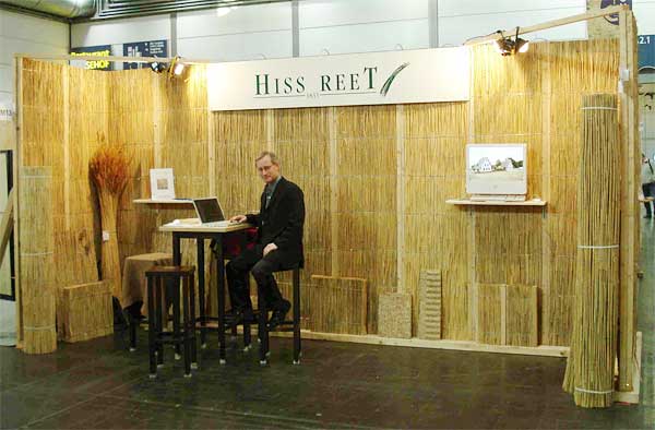 The exhibition stand from reed and wood.